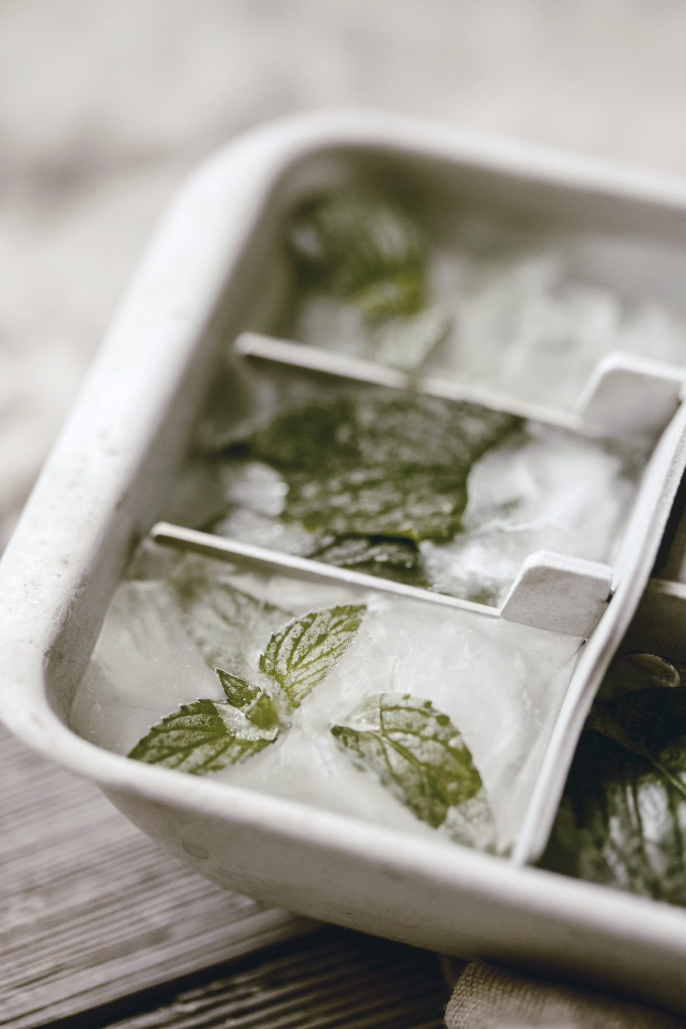 Fresh mint leaves with square shape ice cubes. Creative