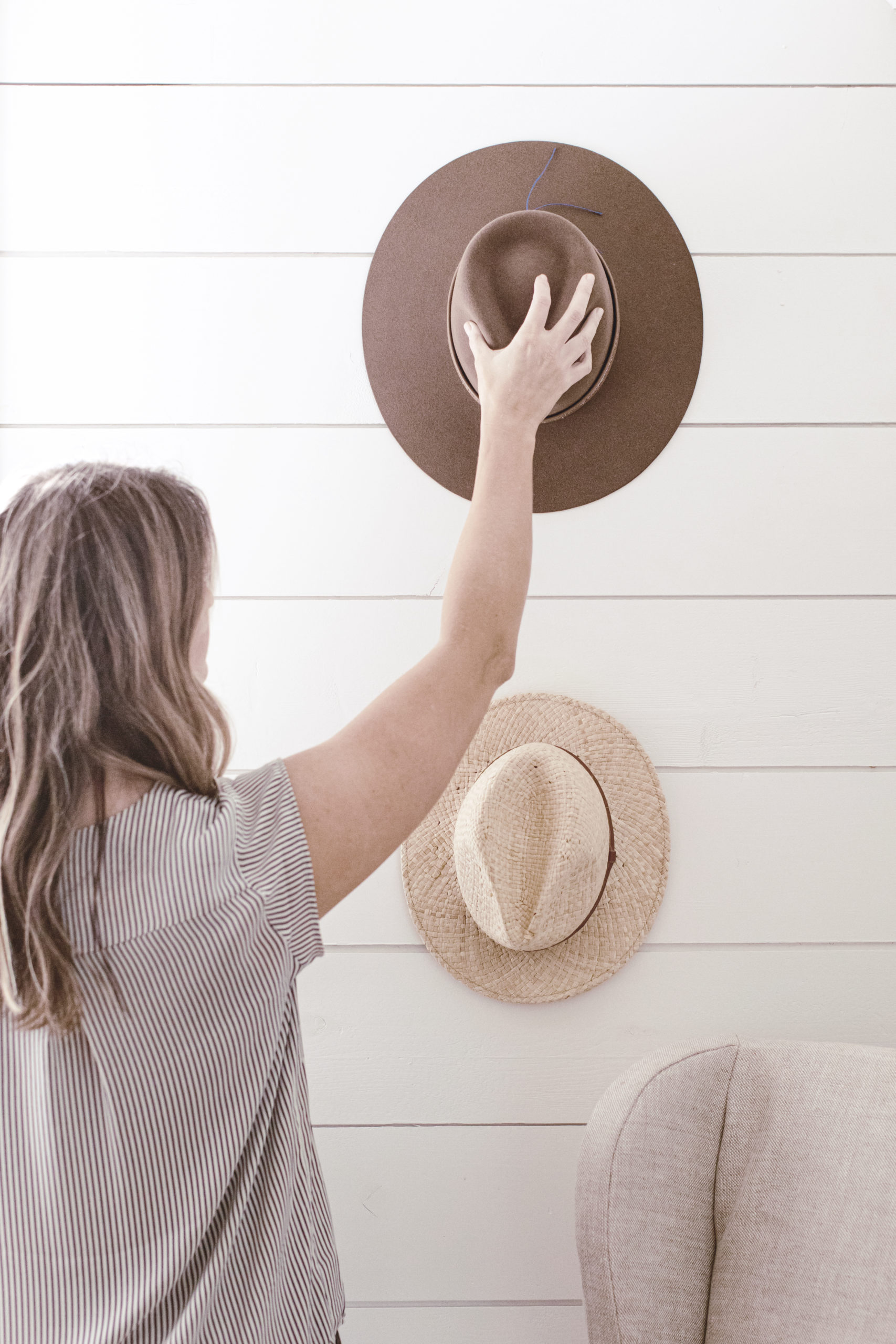 hat wall with trendy women hats