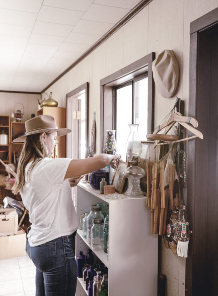 woman sourcing antiques & vintage goods